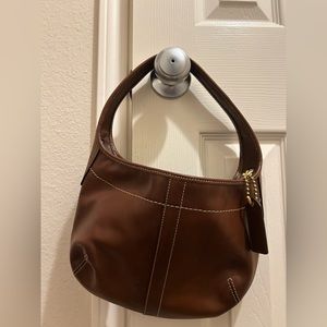 Brown leather coach bag